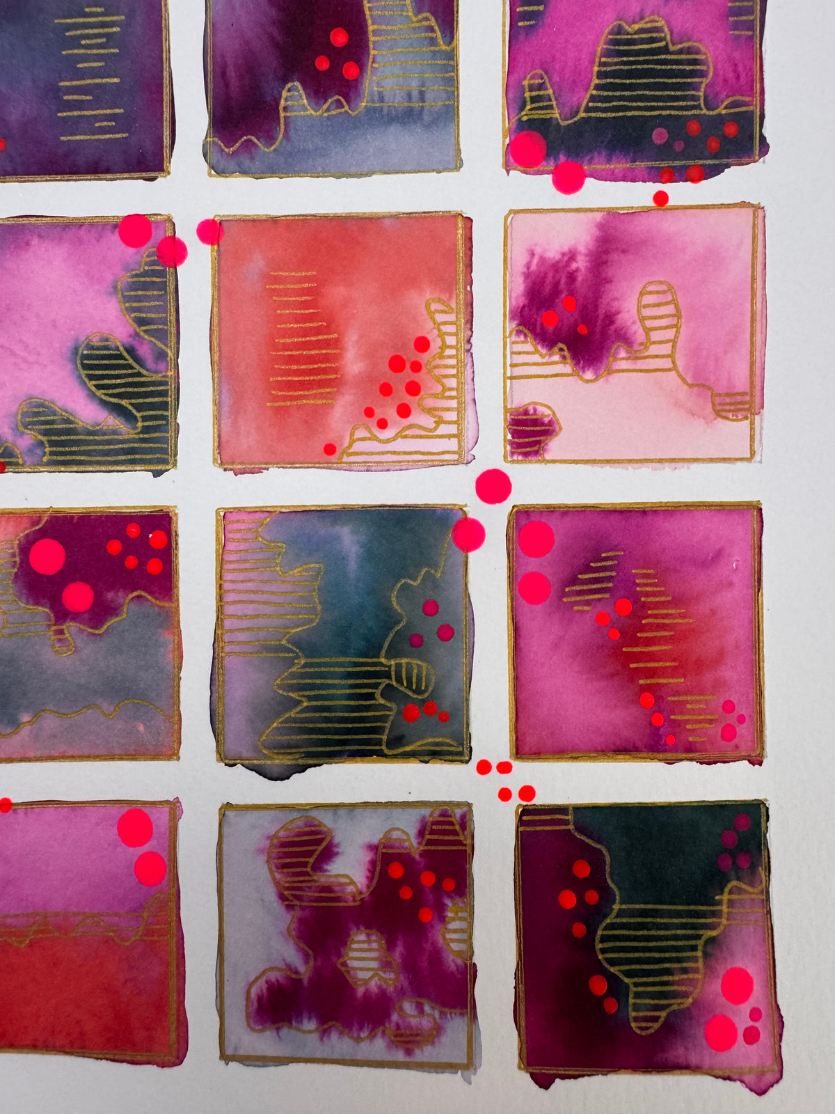 Watercolour painting of fifteen magenta, plum, coral and slate squares in a grid, each outlined in gold, with gold-striped contour shapes and bright pink dots.