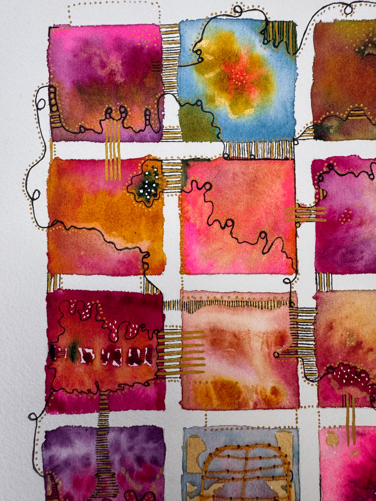Watercolour painting of fifteen hot pink, orange, crimson and blue squares in a grid, linked by a looping black line and gold dots, with gold patches and a hand-stitched ochre thread grid in the centre square.