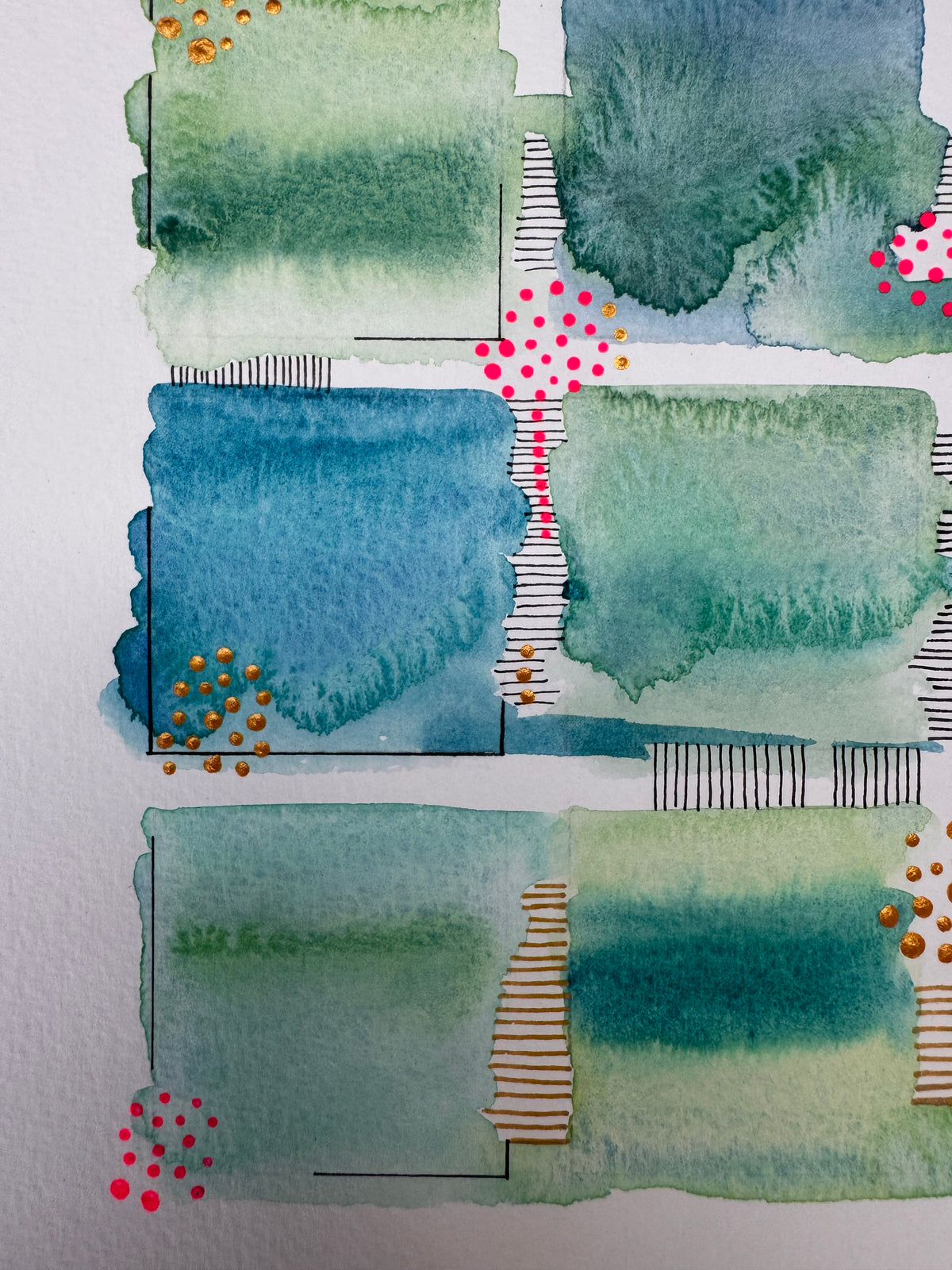 Watercolour painting of fifteen green, teal and blue squares in a loose grid with soft bleeding edges, fine black corner lines, two gold-edged squares, and clusters of bright pink and gold dots.