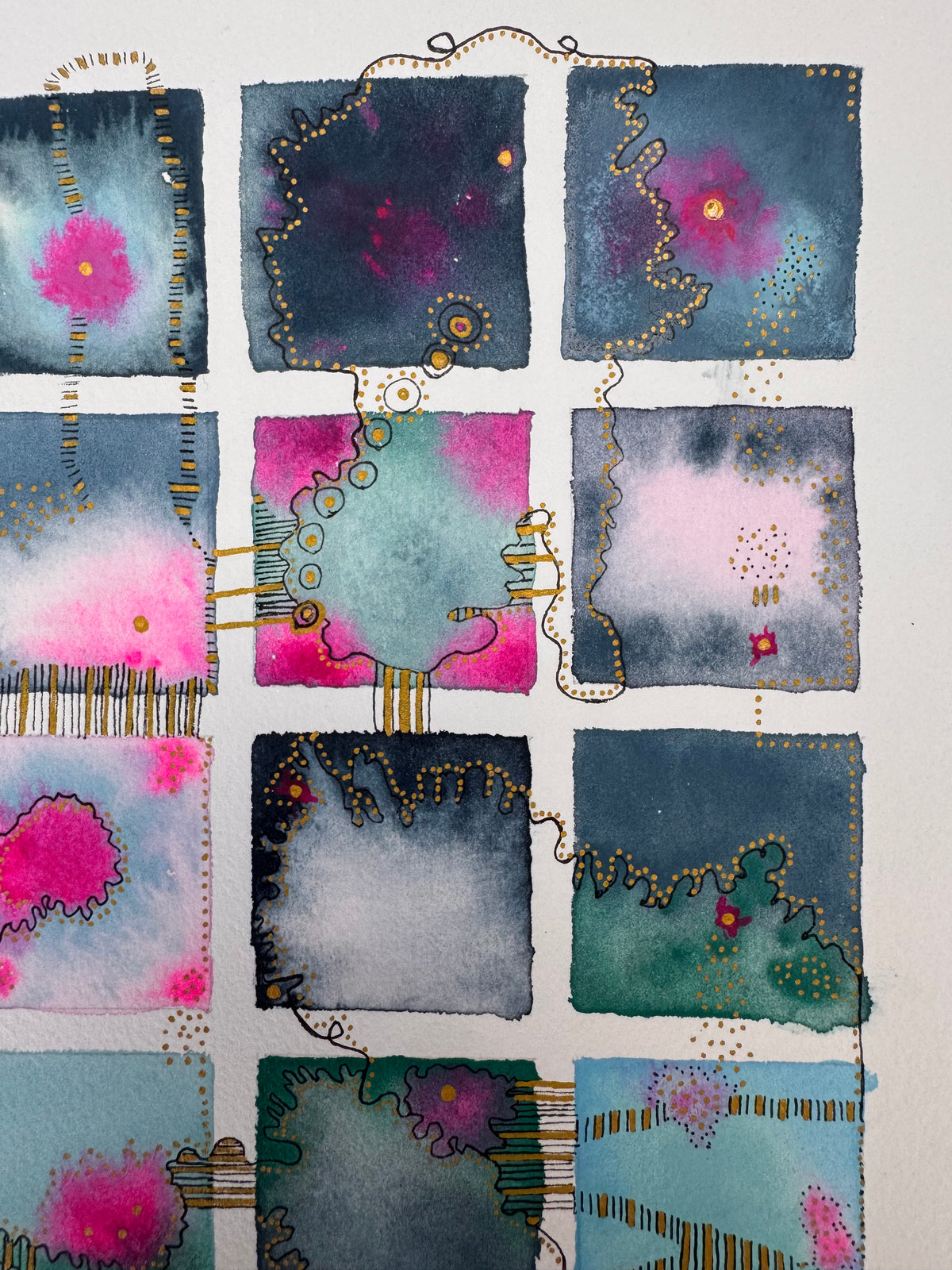 Watercolour painting of fifteen indigo, slate, sky blue and emerald squares in a grid, with glowing hot pink blooms, gold dotted contours, a looping black line and gold-striped links between squares.