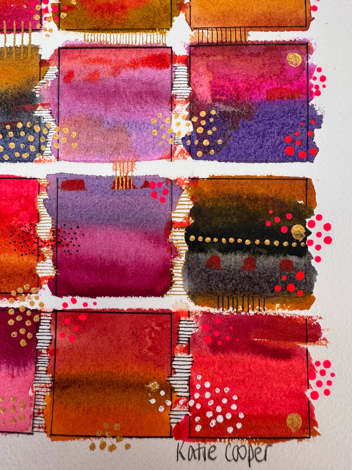 Watercolour painting of fifteen saffron, scarlet, crimson, plum and violet squares in a grid, each in soft horizontal bands and edged with a fine black frame, with gold dots, white dots and bright pink dots spilling past the edges.