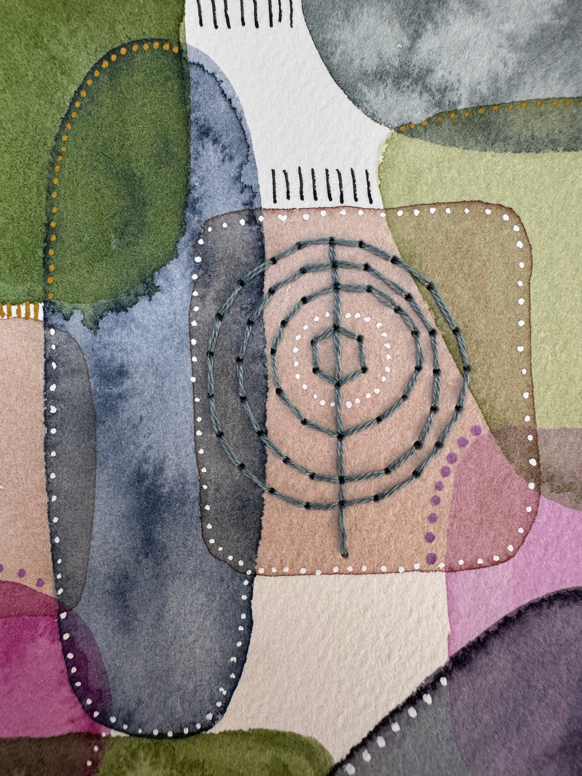 Portrait abstract watercolour of overlapping rounded shapes in moss green, magenta, lilac, blush and slate grey, stacked like stones, with a hand-stitched seed-head flower and rings, gold spirals, black ink hatching and dotted outlines in black and white.