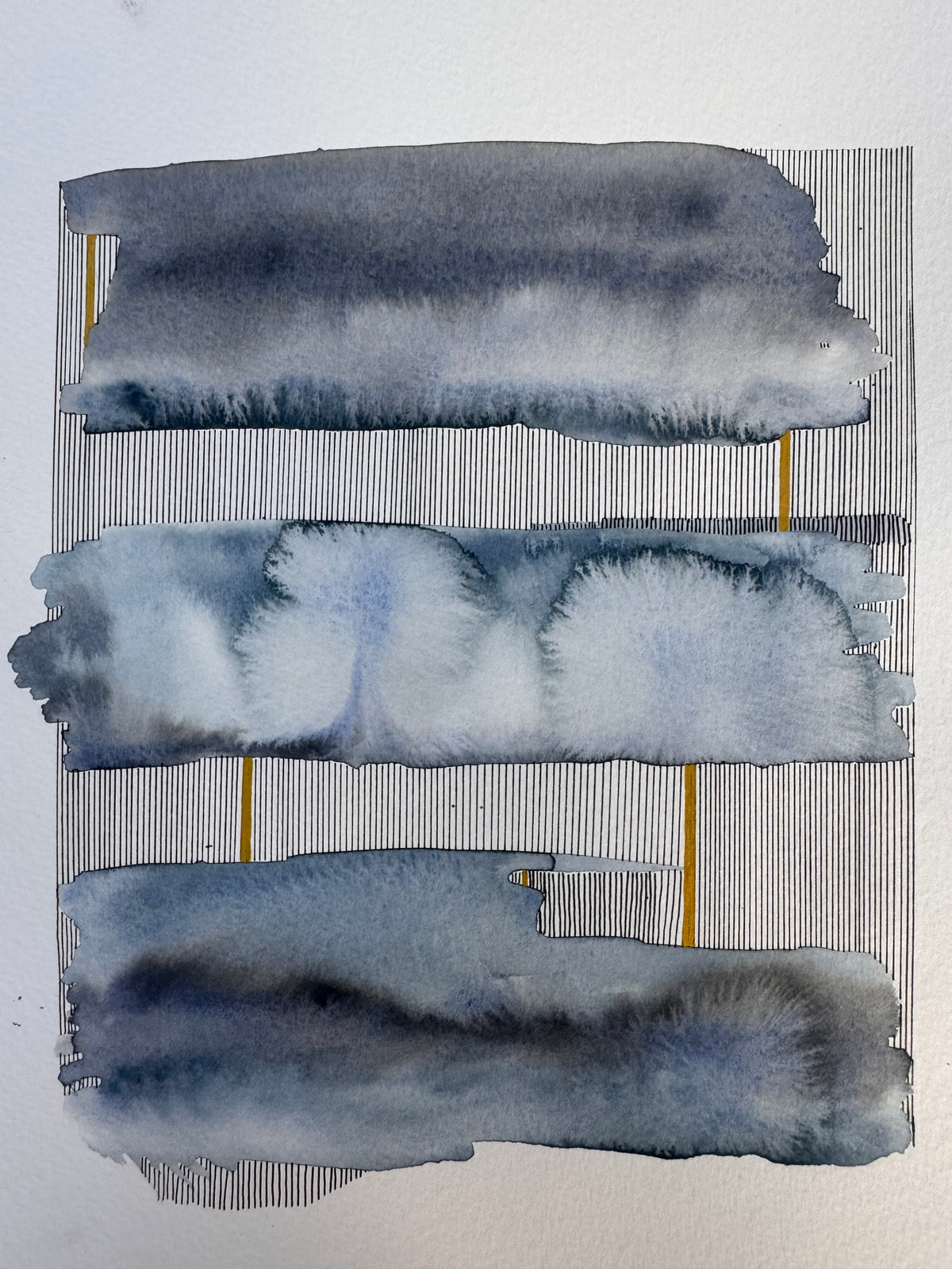 Portrait abstract watercolour of three horizontal bands in indigo, slate and pale blue-grey with soft feathered blooms, separated by rows of fine vertical black ink lines and single upright bars of gold.