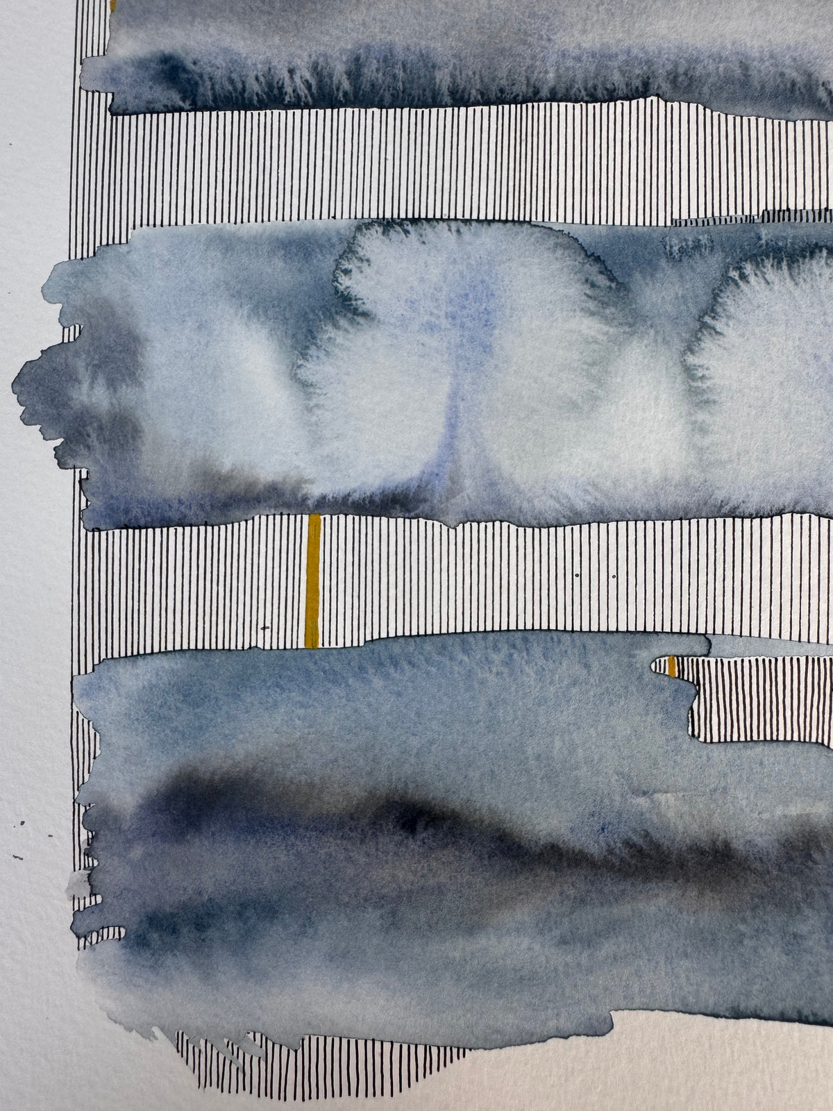 Portrait abstract watercolour of three horizontal bands in indigo, slate and pale blue-grey with soft feathered blooms, separated by rows of fine vertical black ink lines and single upright bars of gold.